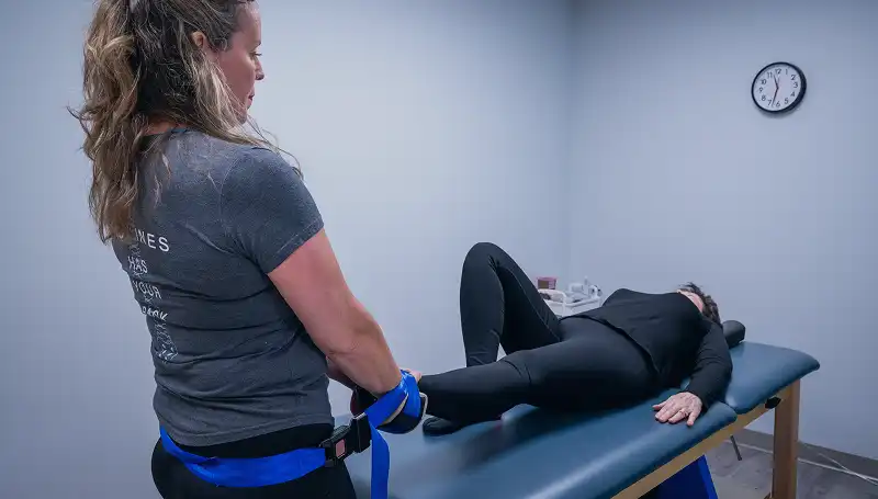 Private physical therapy session integrated with Pilates for injury rehabilitation pain relief and movement correction