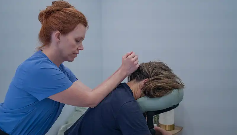 Therapeutic massage therapy session supporting muscle recovery pain reduction and improved mobility at wellness studio in Harvard MA